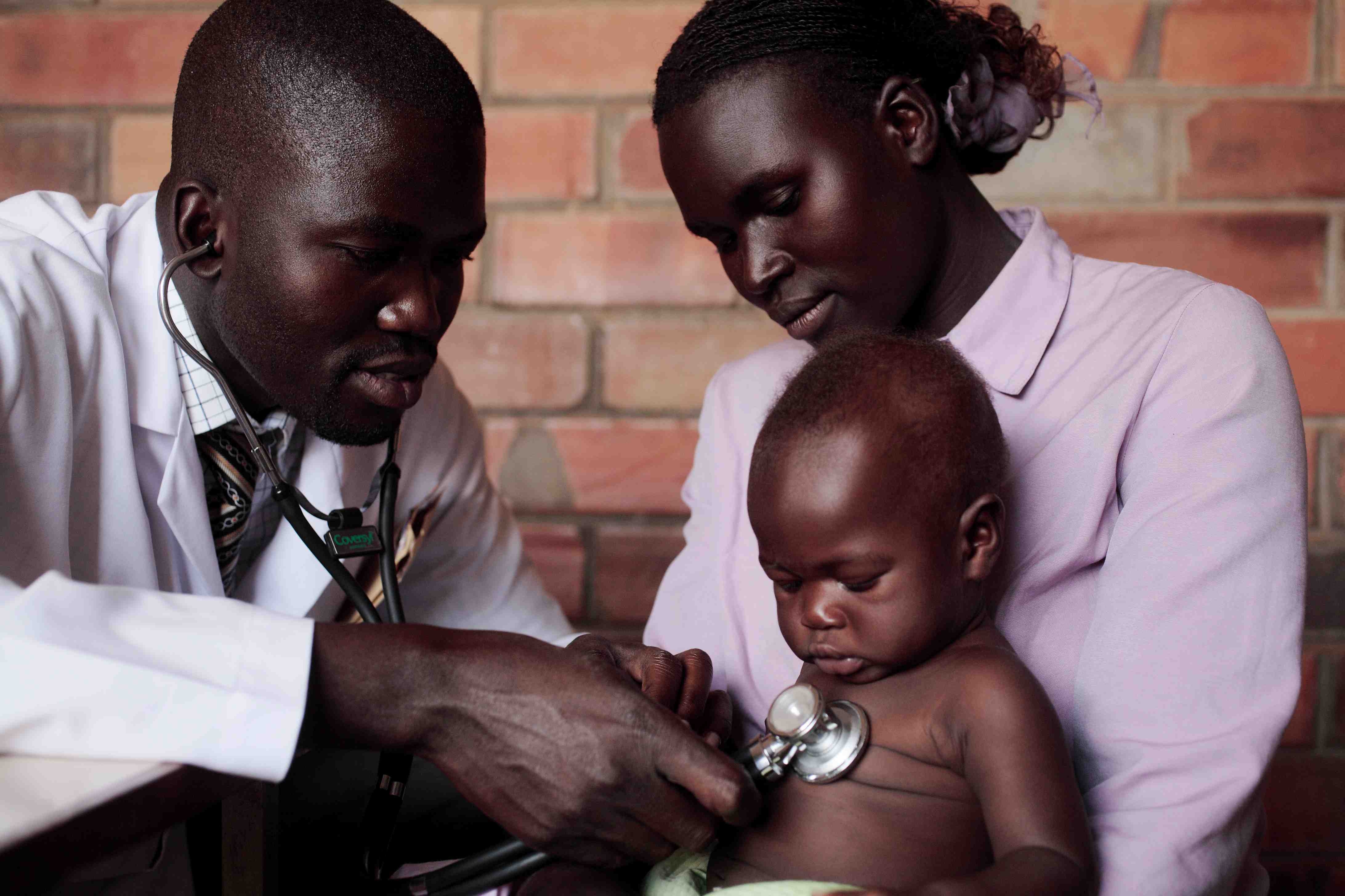 Medical care for a child in Uganda