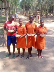 Community member participating in St. Kizito Uganda Fund work